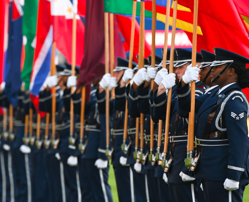 The United States Air Force Honor Guard parades the country flags